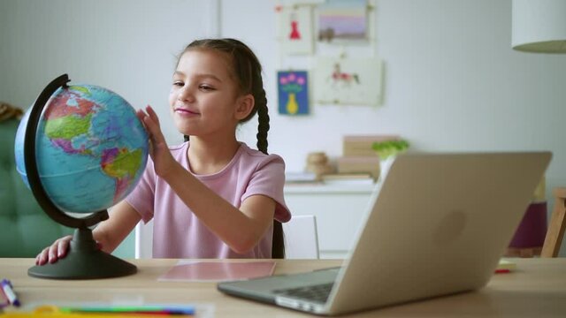 Home education for children girl shows country on globe Spbd