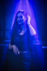 woman having fun dancing at night disco club