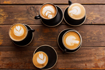 Different coffee cups on a table 
