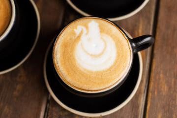 Close up of a cup of a latte coffee