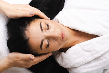 Caucasian woman head massage spa. Facial treatment. Beauty skin female face. Girl beauty face care.