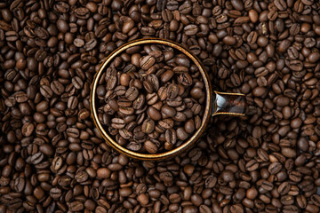 Food background with black roasted coffee beans