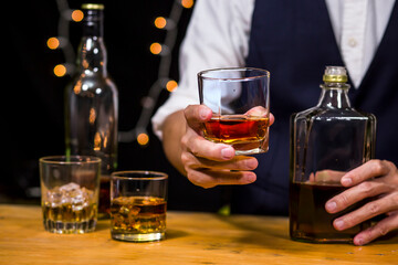 Bartender Serve Whiskey, on wood bar, 