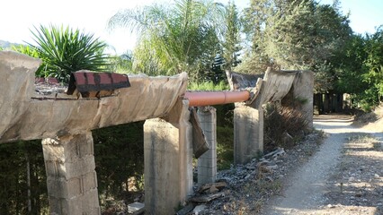 Partly repaired irrigation aquaduct