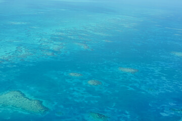 Beautiful Caribbean sea of emerald green as seen from the sky