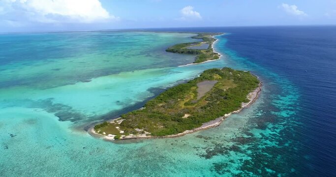 Los roques Venezuela over with blue water Moving-turn pan LEFT  aerial view boca de Cote Caribbean sea