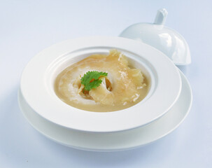 braised superior whole shark's fin thick soup with golden stock seafood in white background asian halal menu