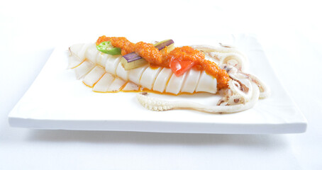 steamed fresh octopus squid in spicy nyonya chilli sambal sauce seafood in white background asian halal menu
