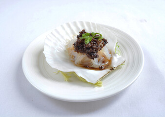steamed scallop with vermicelli in shell with chef special black bean soy sauce seafood in white background asian halal menu