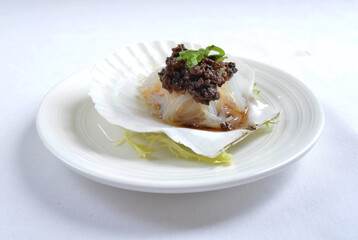 steamed scallop with vermicelli in shell with chef special black bean soy sauce seafood in white background asian halal menu