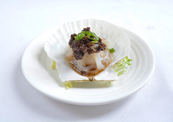 steamed scallop with vermicelli in shell with chef special black bean soy sauce seafood in white background asian halal menu