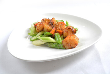stir fried scallop with vegetables in spicy samba xo chilli sauce seafood in white background asian halal menu