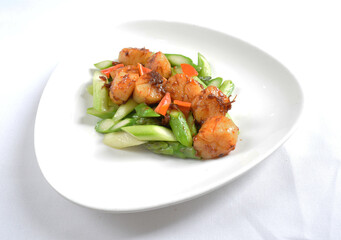 stir fried scallop with vegetables in spicy samba xo chilli sauce seafood in white background asian halal menu