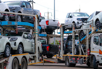 Car carrier trailer transport new car from manufacturing factory to dealer. Auto vehicle haul truck...