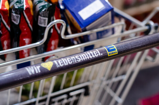 Soest, Germany - August 7, 2021: Shopping trolley in EDEKA. The Edeka Group is the largest German supermarket corporation as of 2017, holding a market share of 20.3%.