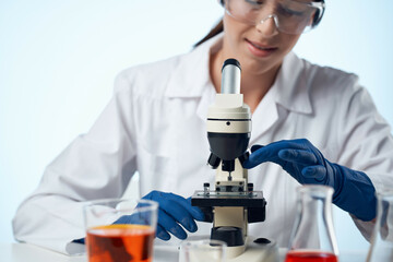 female laboratory assistant chemistry research microbiology