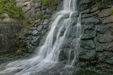 Fototapeta na wymiar Details of a beautiful waterfall in countryside