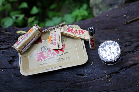 Raw natural rolling paper smoking kit with grinder - Mexico, June 2021

