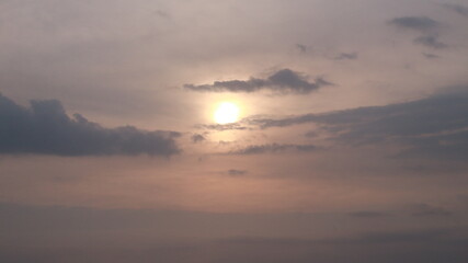 clouds with a view of the orange-purple sky