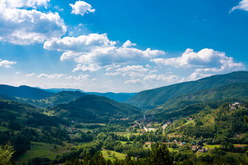 Beautiful mountain landscape with general view over green valley