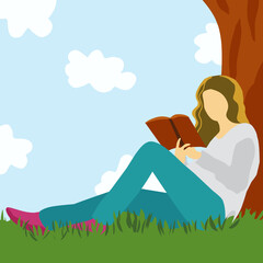 Girl with a book in the nature.