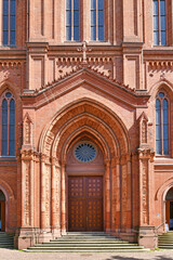 Fototapeta na wymiar Wiesbaden, Germany - July 2021: Main entrance of neo-Gothic protestant church called 'Marktkirche'