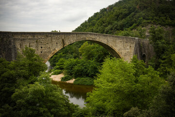 Fototapeta na wymiar big bridge on the town of tournon saint jean