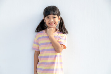 Portrait of happy smiling child girl isolated on white background