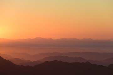 Colorful sunrise in mountains.