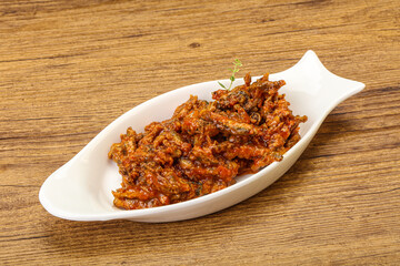 Canned anchovy in tomato sauce