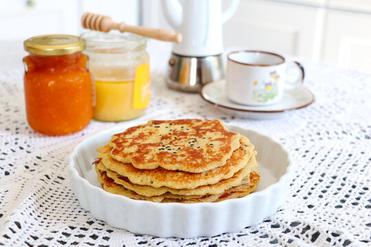 image of pancakes with cup of coffee and yam, honey for accompany isolated background.