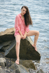 Beautiful adult woman enjoy sea on sunny day.