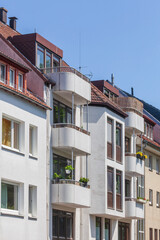 Fototapeta na wymiar Moderne Wohngebäude mit Balkonen, Reihenhäuser, Mehrfamilienhäuser, Bremen, Deutschland