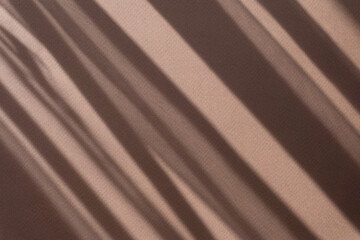Fototapeta na wymiar Minimalistic abstract brown background with a shadow in form of stripes on surface from sun's rays. Ready-made mockup for your ad
