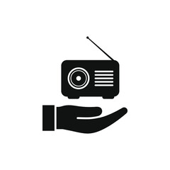Radio on hand flat icon isolated on white background. Vector illustration