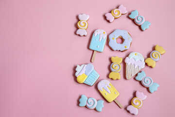 Colorful gingerbread cookies in colored glaze of different shapes.