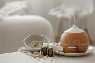 Spa composition with air humidifier and essential oils.
