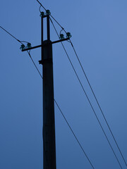 Fototapeta premium Power line in misty twilight.