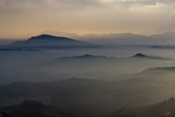 Mist over the hills in the province of Ascoli Piceno in Italy in the morning