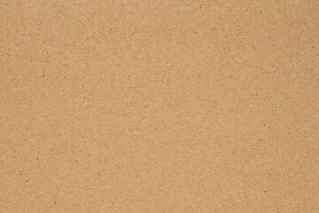 Brown paper or cardboard texture background.