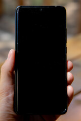 Hand holding a mobile