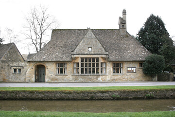Fototapeta na wymiar An old building in Lower Slaughter in Gloucestershire in the UK