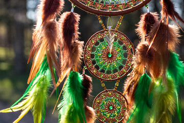 Handmade dream catcher with feathers threads and beads rope hanging