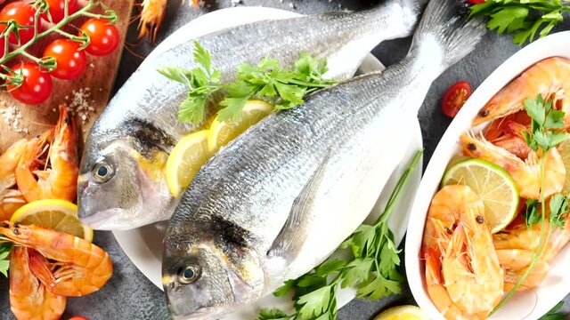raw dorado fish and shrimp