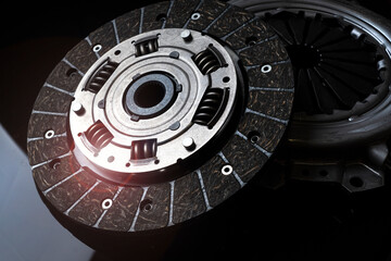 New automobile clutch kit on a black background.