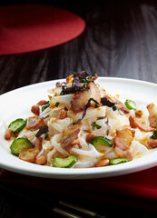 Delicious Chinese food, barbecued sweet and sour sauce rice noodles
