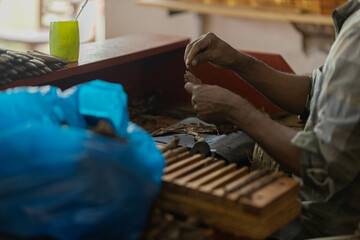 Cigar being made