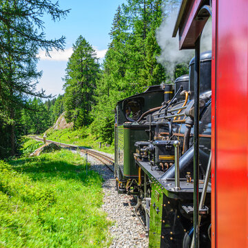 Steam locomotive rides by rail. Switzerland. Furka region.