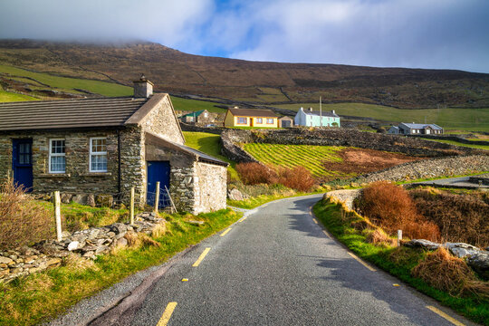 Road across the Atlantic Ocean coast on the Dingle Peninsula, County Kerry, Ireland.