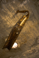 Abandoned curved rusty iron close up.